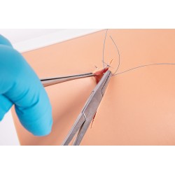 Dispositif d'entraînement de suture cutanée
